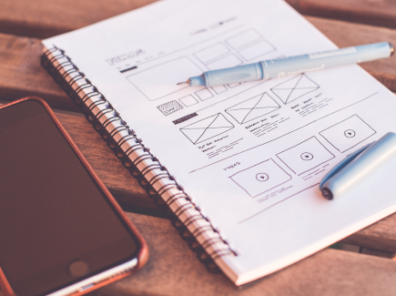 Web design planning on paper